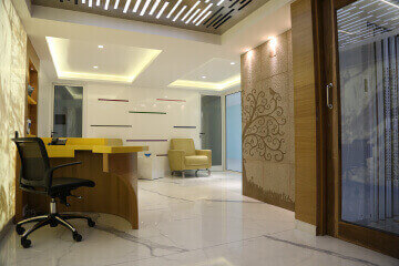 Spacious commercial office lobby interior designed by Vinay Interiors